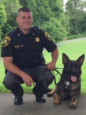 Photo of Chief Deputy Shannon Huffman and K9 Officer Queso